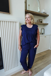 dark navy blue pajama set with flattering top and jogger pant with drawstring and pockets