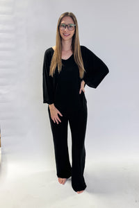 women wearing matching top and bottom knit set black colour