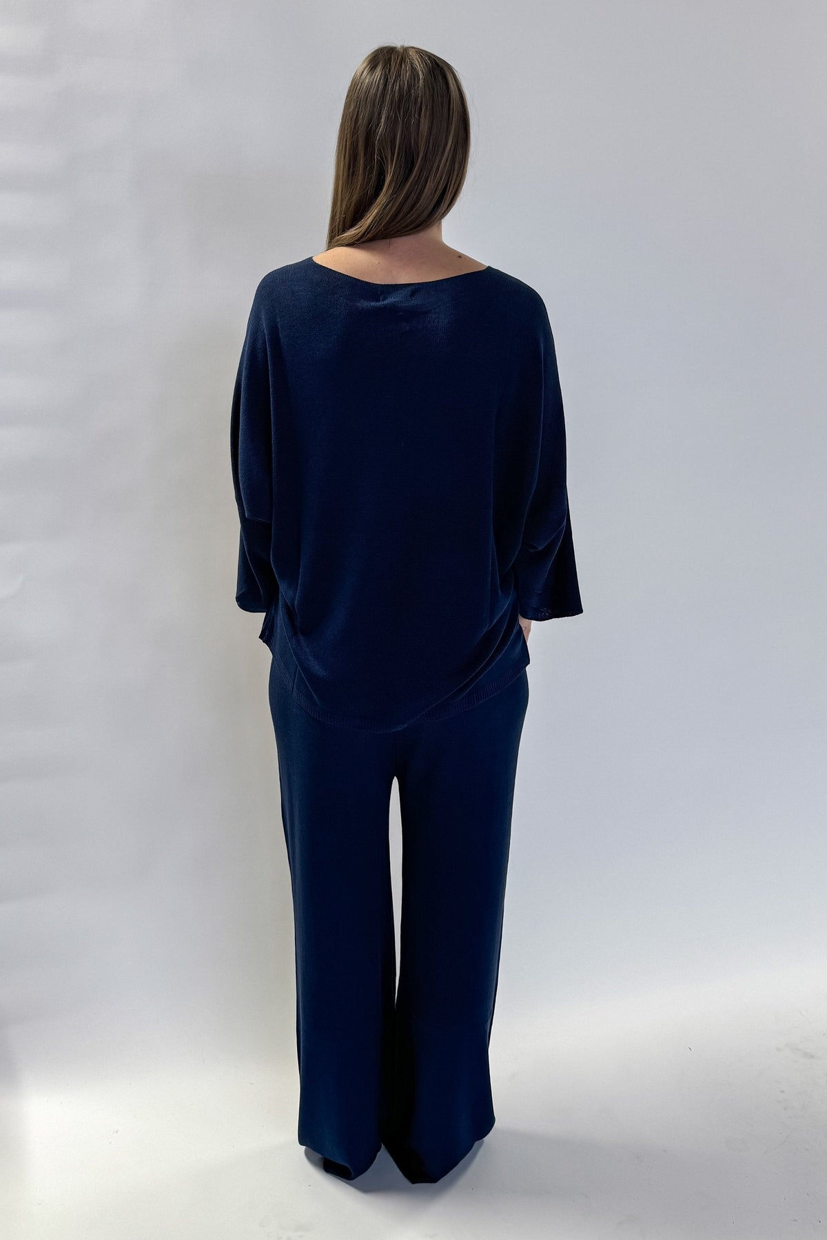 women wearing matching top and bottom knit set navy colour