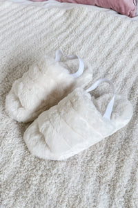 soft white slipper slides with heel strap in faux fur